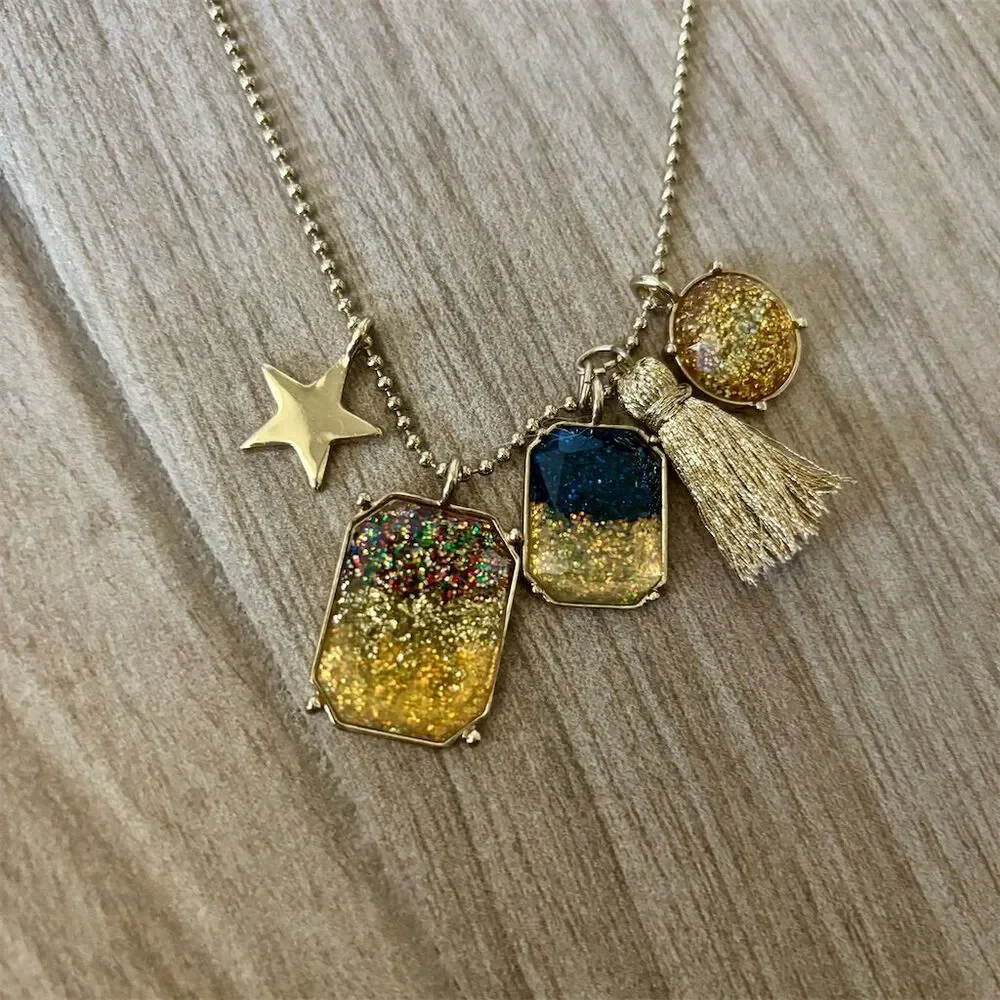 Gold-Tone Necklace with Star & Tassel Charms